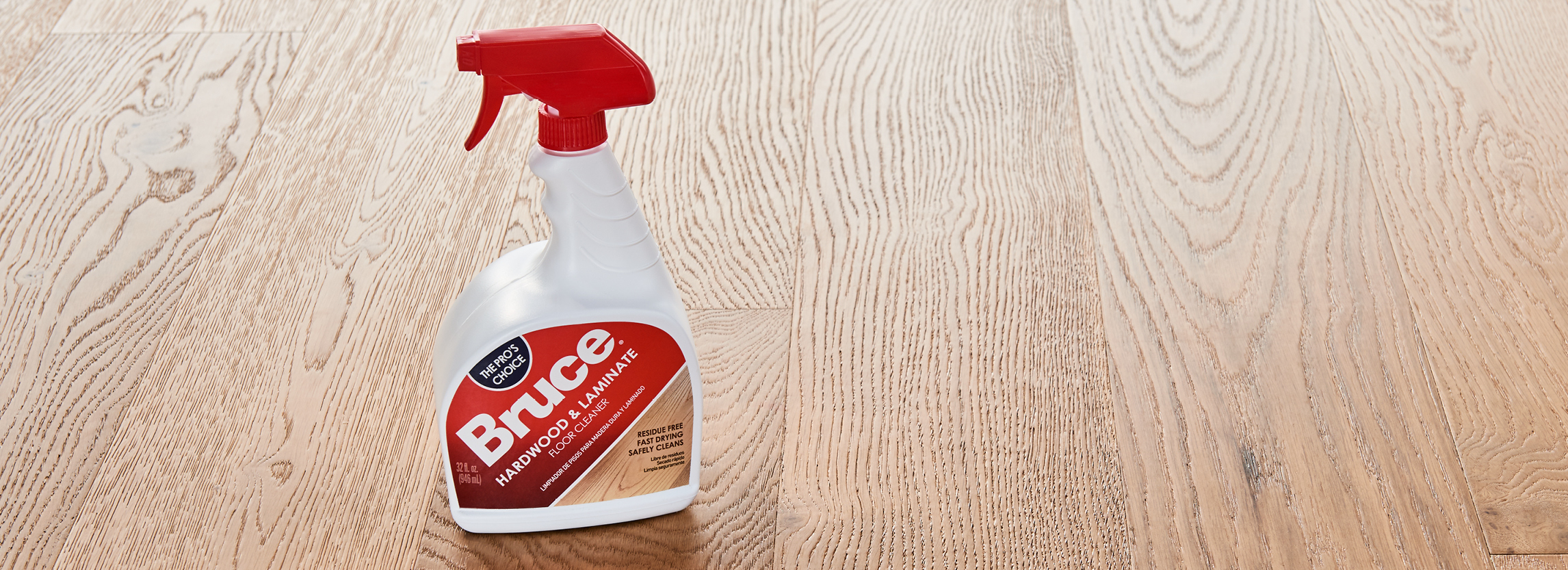 Wood floor with spray bottle of Bruce Hardwood Flooring Cleaner