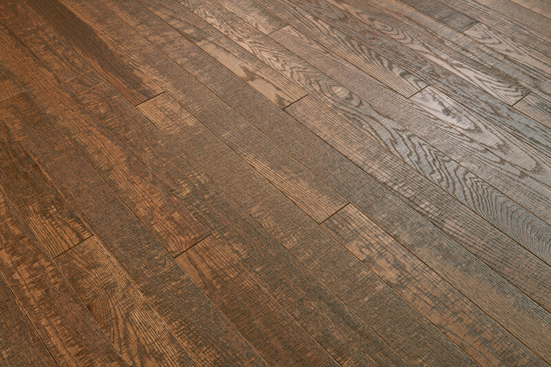 Closeup of Barnwood Living wood flooring with a wire brushed texture