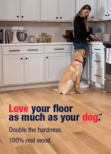 Woman in kitchen with dog on Bruce Dogwood flooring