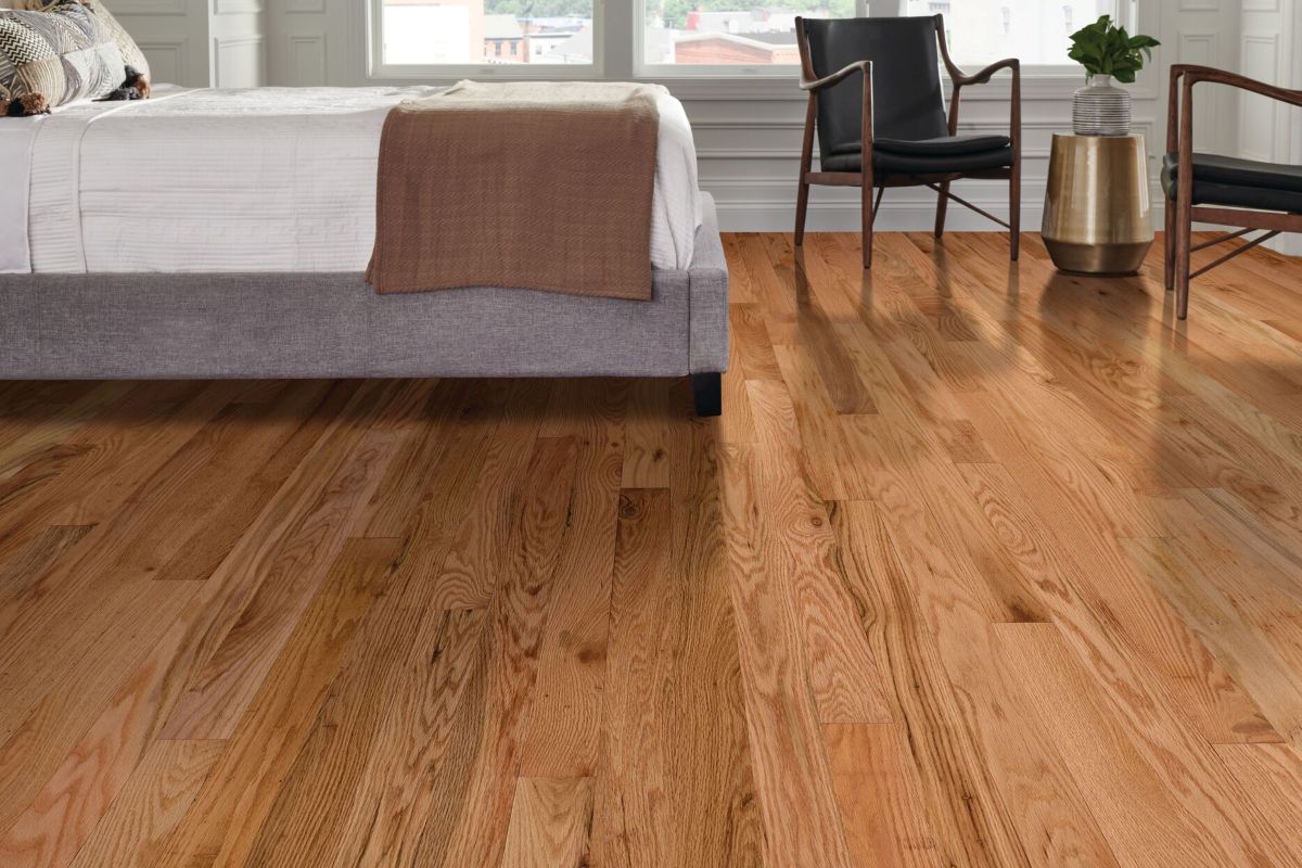 Closeup of a prefinished solid oak hardwood floor in a living room