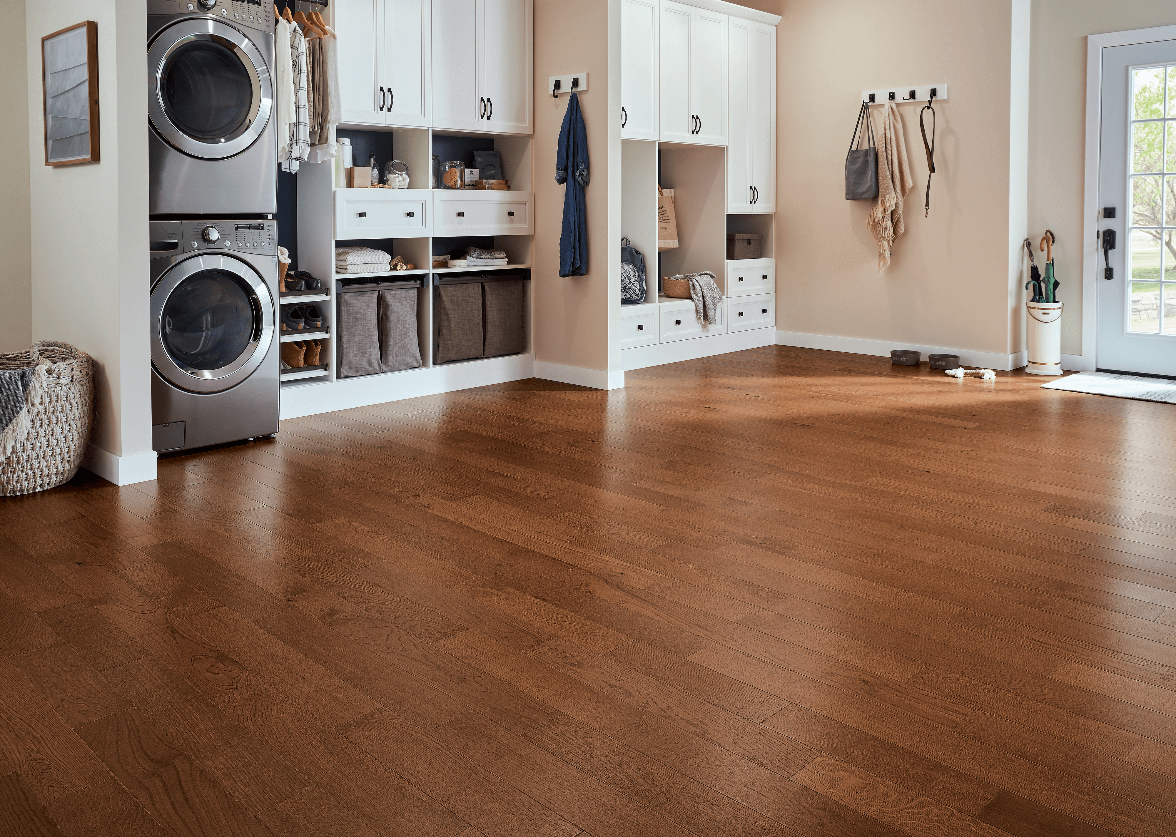 Spacious mudroom and laundry area with Bruce hydropel oak engineered flooring