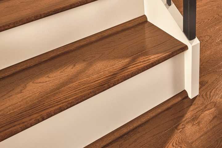 staircase showing wood molding and trim